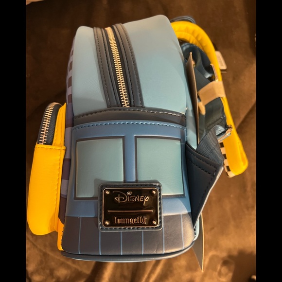 LOUNGEFLY DISNEY OLIVER & COMPANY TAXI RIDE MINI BACKPACK - Picture 2 of 3